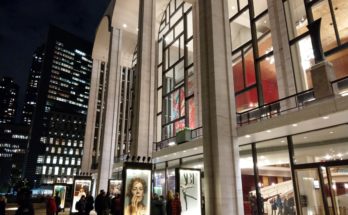 A photo of the front of the Metropolitan Opera House.