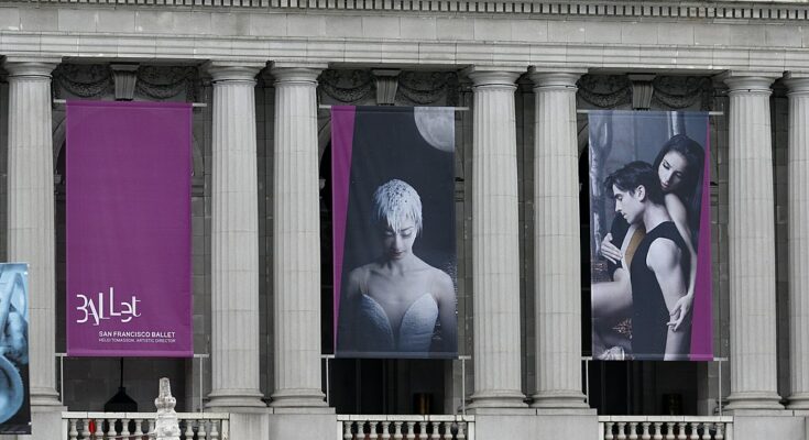 A photo of banners for San Francisco Ballet hanging outside War Memorial Opera House, San Francisco, CA.