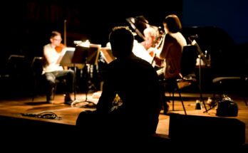 A photo of members of London Sinfonietta rehearsing.