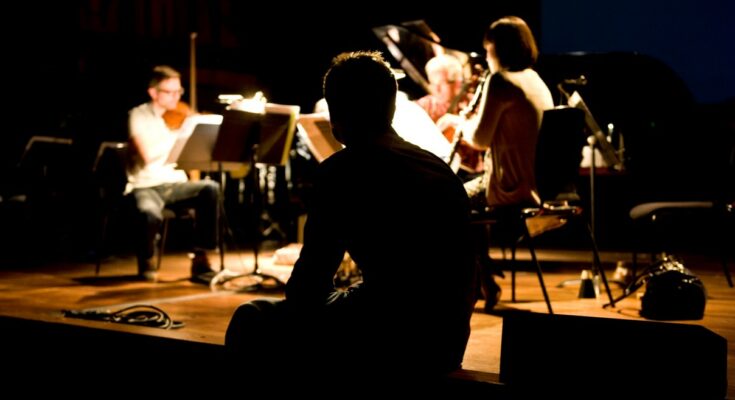 A photo of members of London Sinfonietta rehearsing.