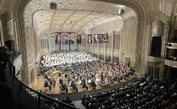 A photo of the Cleveland Orchestra performing.