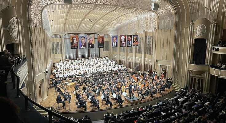 A photo of the Cleveland Orchestra performing.