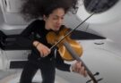 SpaceX astronaut Sarah Gillis performing "Rey's Theme" from "Star Wars: The Force Awakens" on her violin. Photo: Space Intelligence via https://youtu.be/lD1ixTr4JWY?si=zJbzpWzM839G8b4j