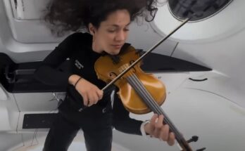 SpaceX astronaut Sarah Gillis performing "Rey's Theme" from "Star Wars: The Force Awakens" on her violin. Photo: Space Intelligence via https://youtu.be/lD1ixTr4JWY?si=zJbzpWzM839G8b4j